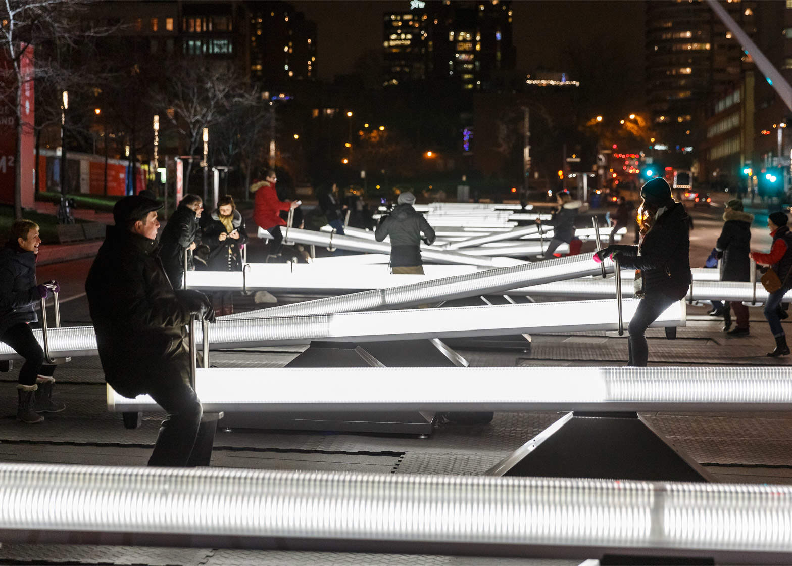 Designers create 30 glowing seesaws that produce music