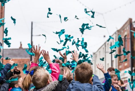 blue confetti being thrown