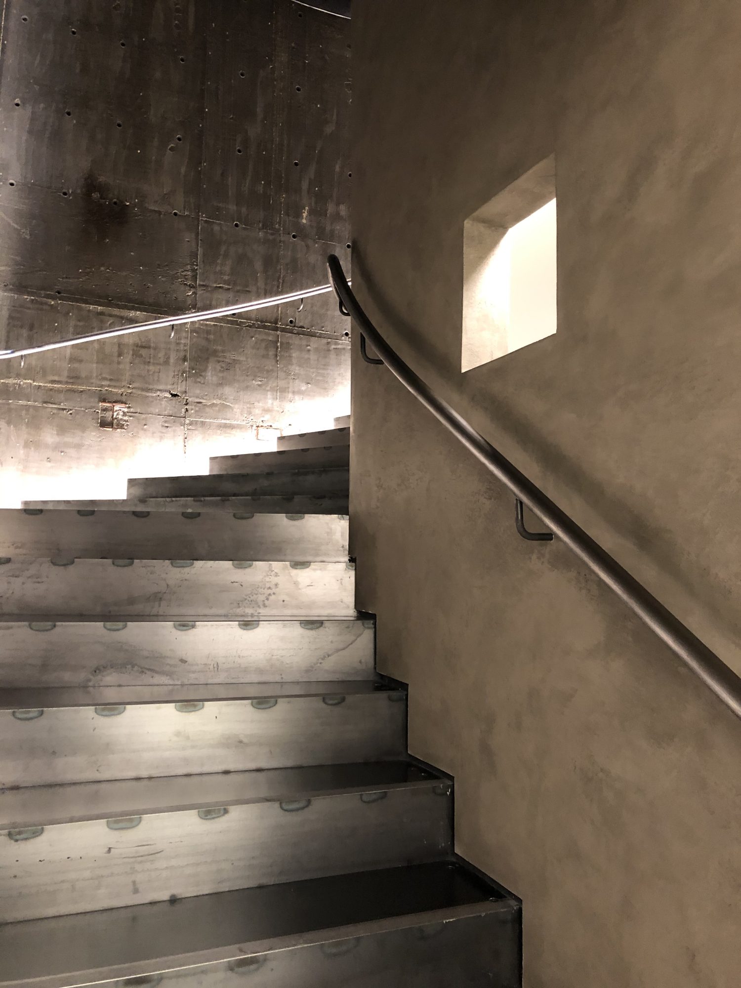 concrete staircase at stella mccartney store