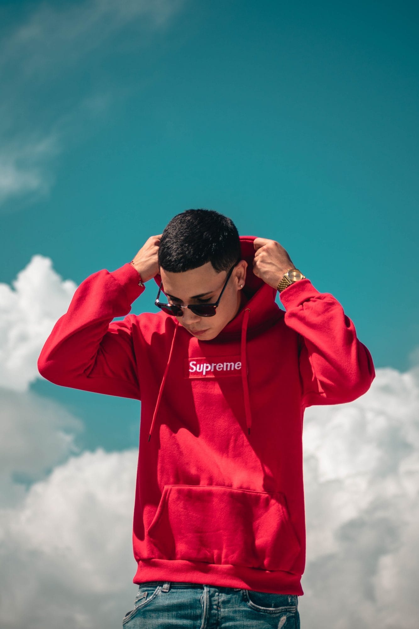 Man in Supreme hoodie from drop culture campaign