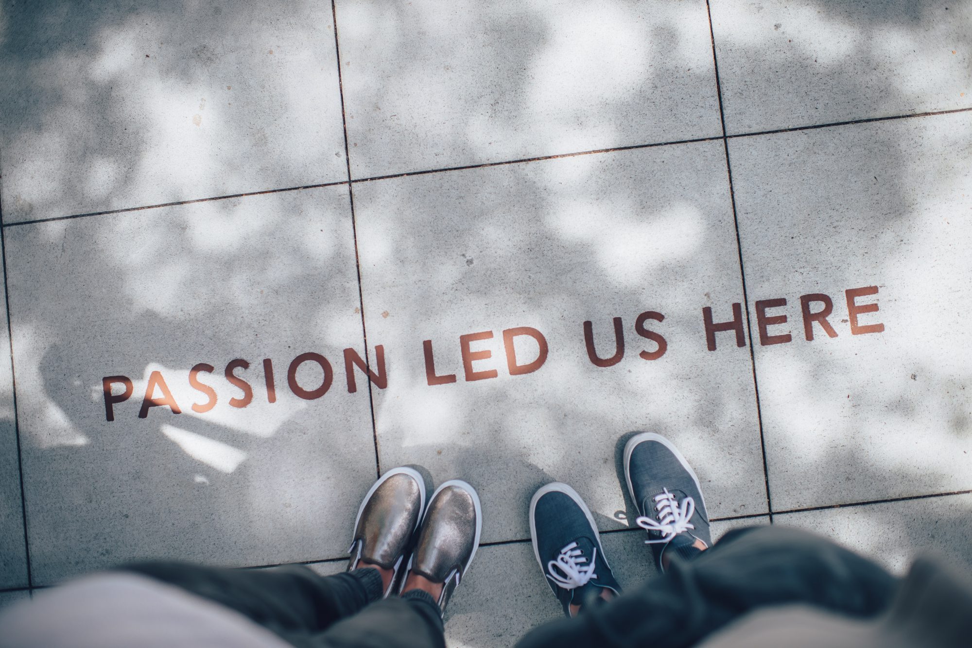 Passion lead us here on sidewalk